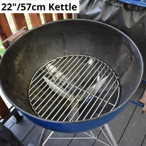 57cm charcoal grate fitted to a blue weber kettle sitting on a deck