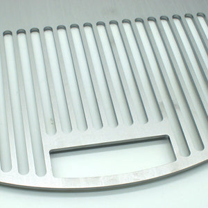 Close up view of the grill and the handle, the handle fits over OEM grill handle