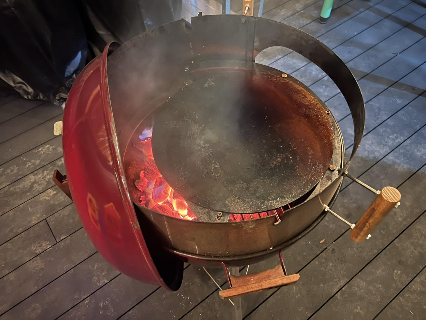CLD Fabrication pizza steel fitted to a Weber Kettle BBQ using a plate holder and riser ring