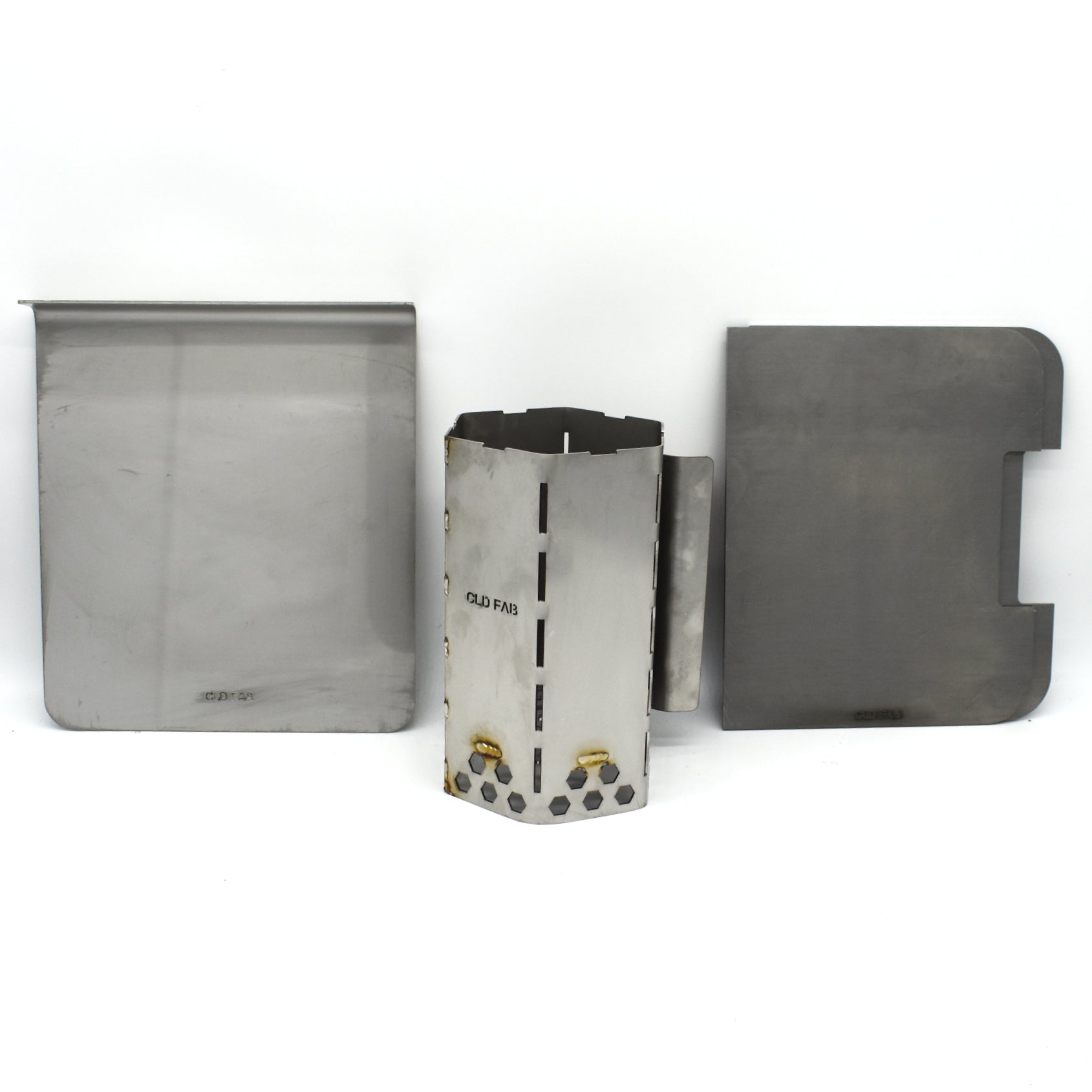 bundle kit showing a chimney start, grill/plate combo and an offset plate