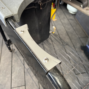 Stainless weber mounting bracket bolted to a Performer Kettle