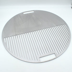 Angled view of the Half Half smash plate, round in shape for cooking over charcoal