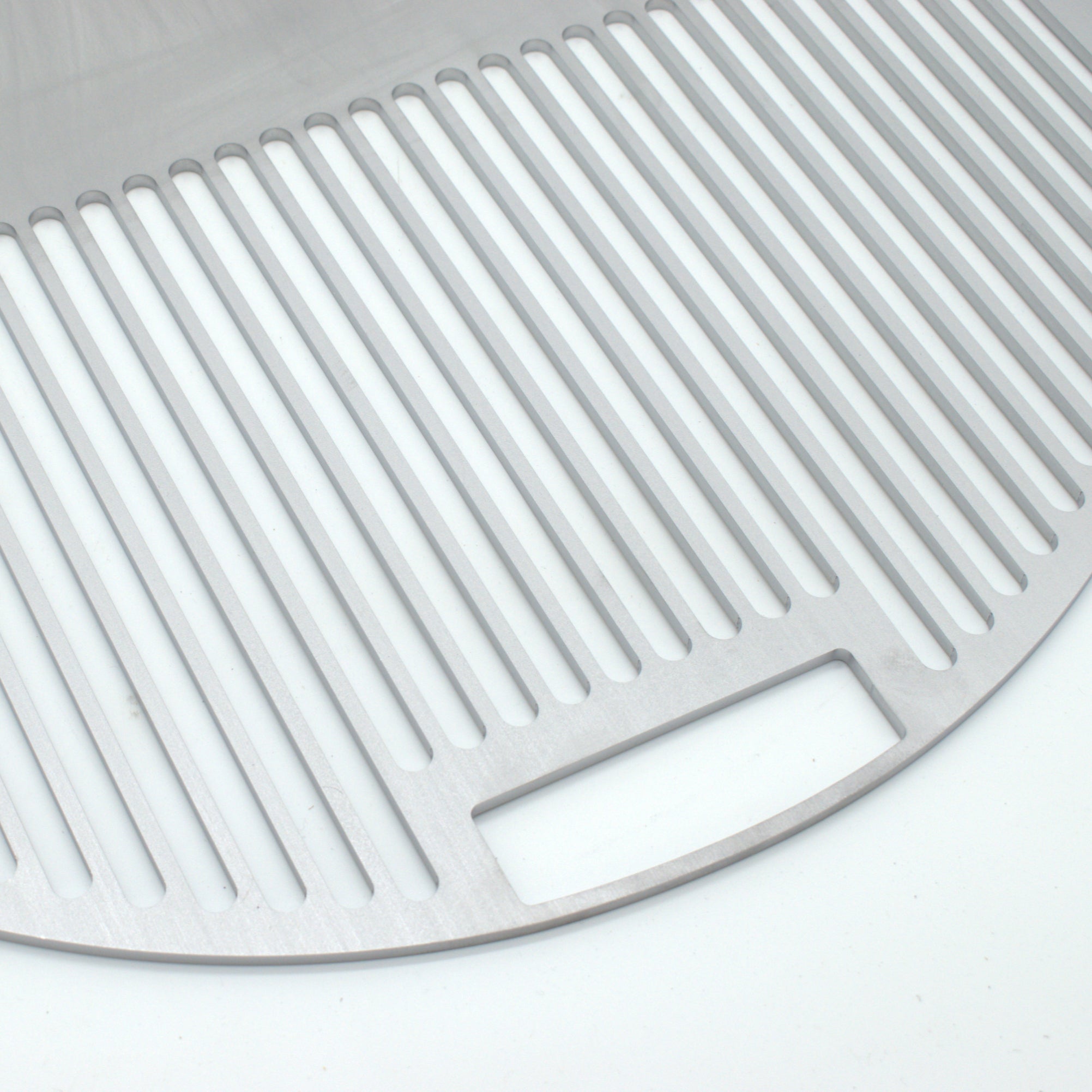 Close up view of the grill and the handle, the handle fits over OEM grill handles