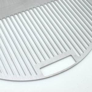 Close up view of the grill and the handle, the handle fits over OEM grill handles