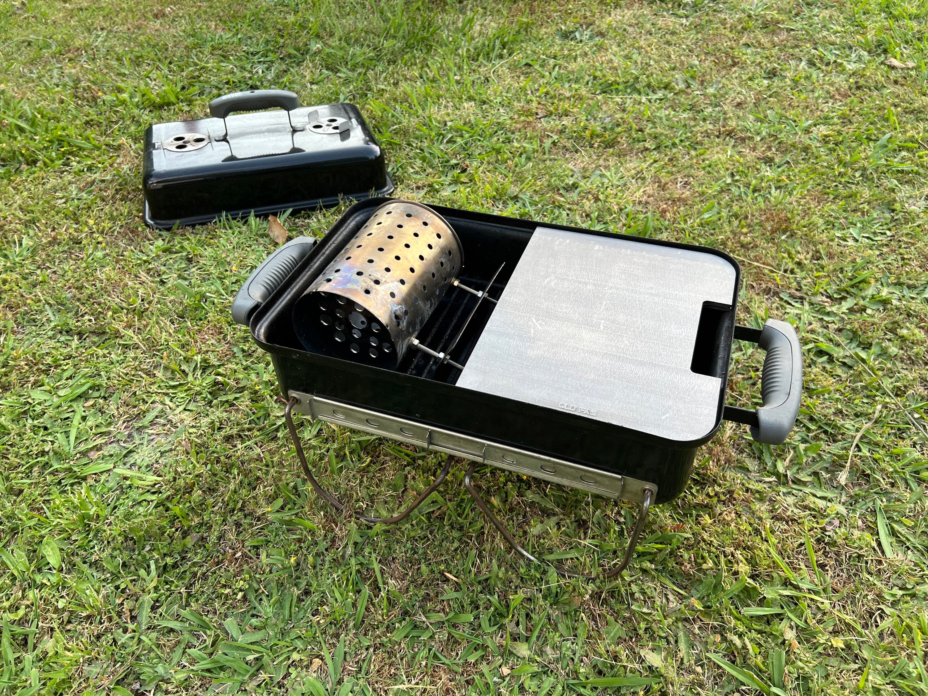 half plate fitted to a weber GA with a chimney inside