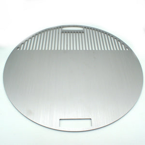 Angled view of the round grill plate, special cooking stainless plate