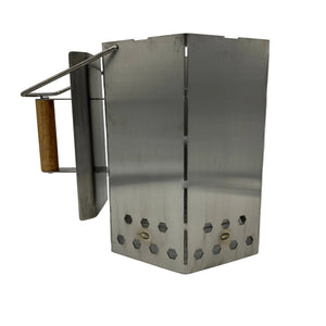 Side view of extra large stainless steel charcoal chimney showing welded panels, hexagonal air vents and timber handle.