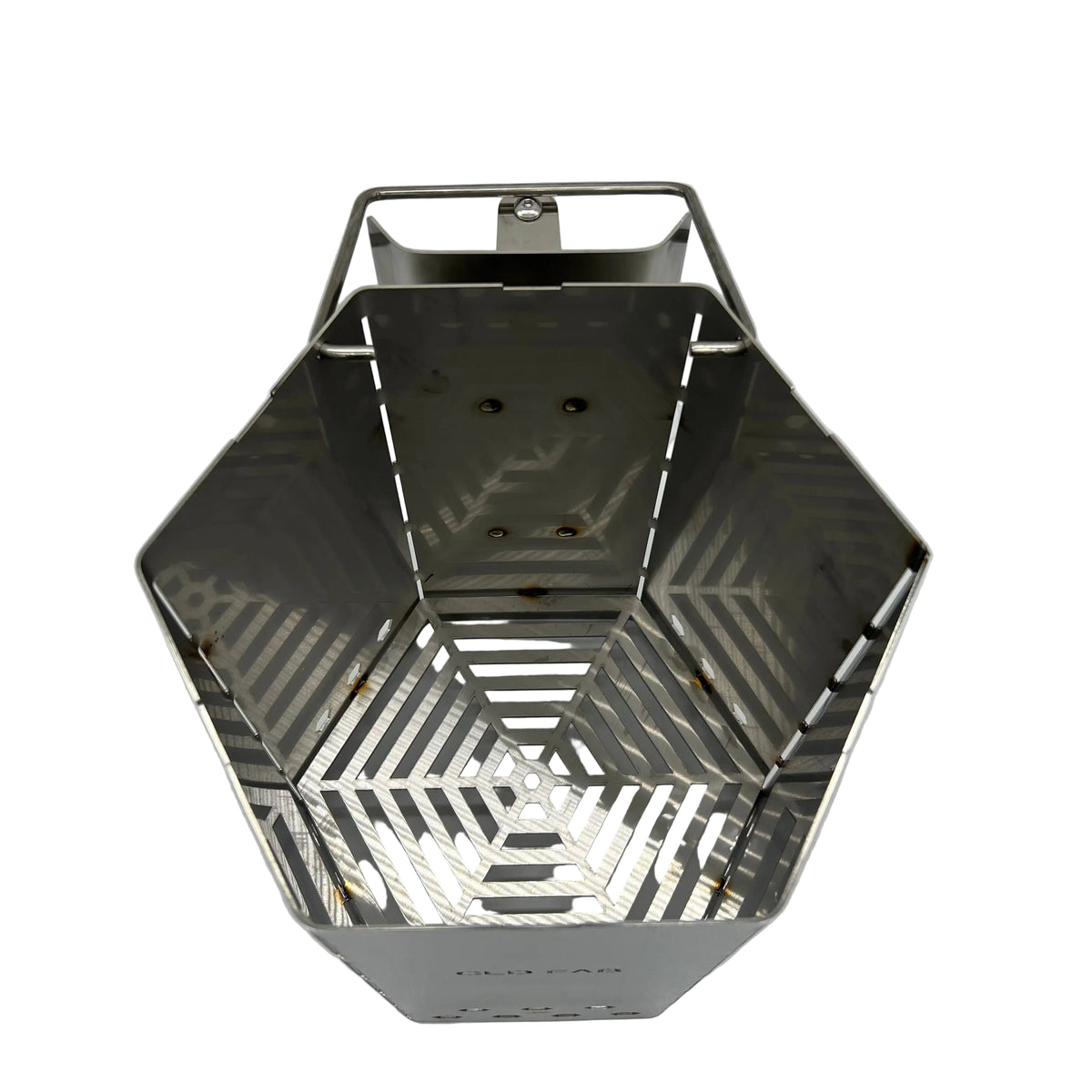 Top-down view inside CLD Fabrication extra large charcoal chimney showing the slotted charcoal grate and hexagonal chamber.